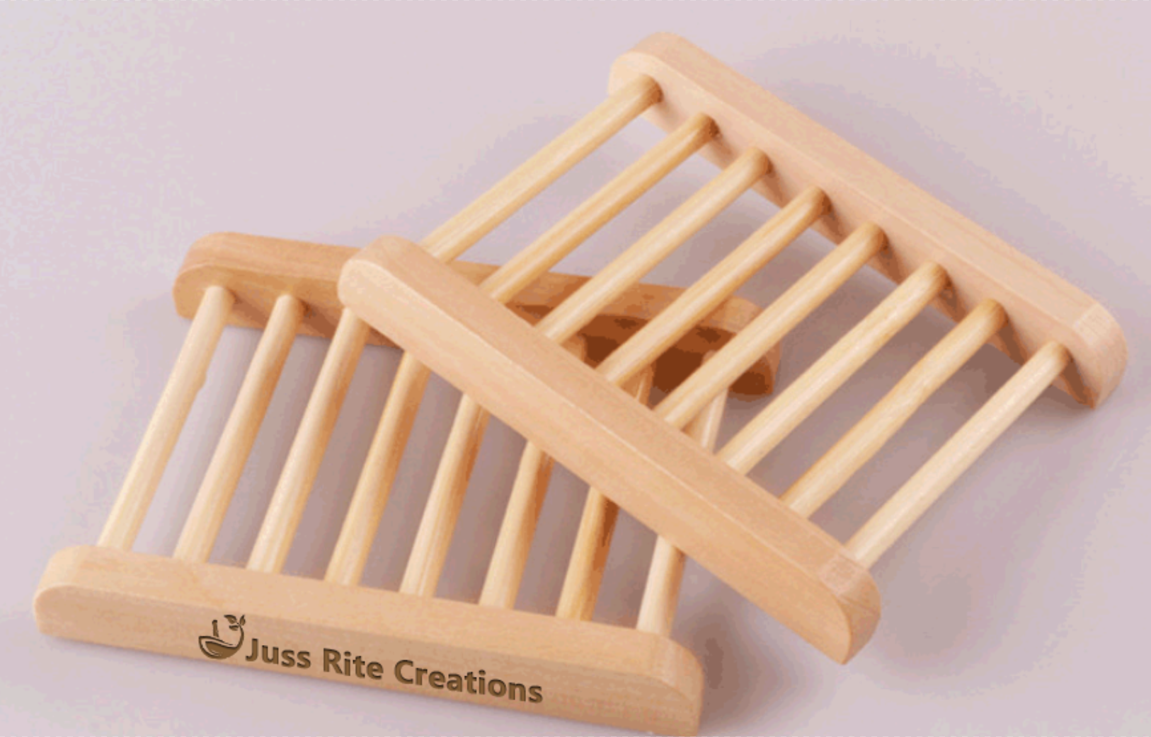 Wooden rack with 'Juss Rite Creations' branding on a light background